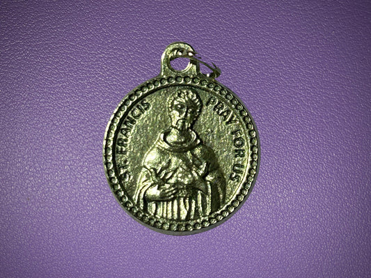 Medal with a religious figure on a purple background